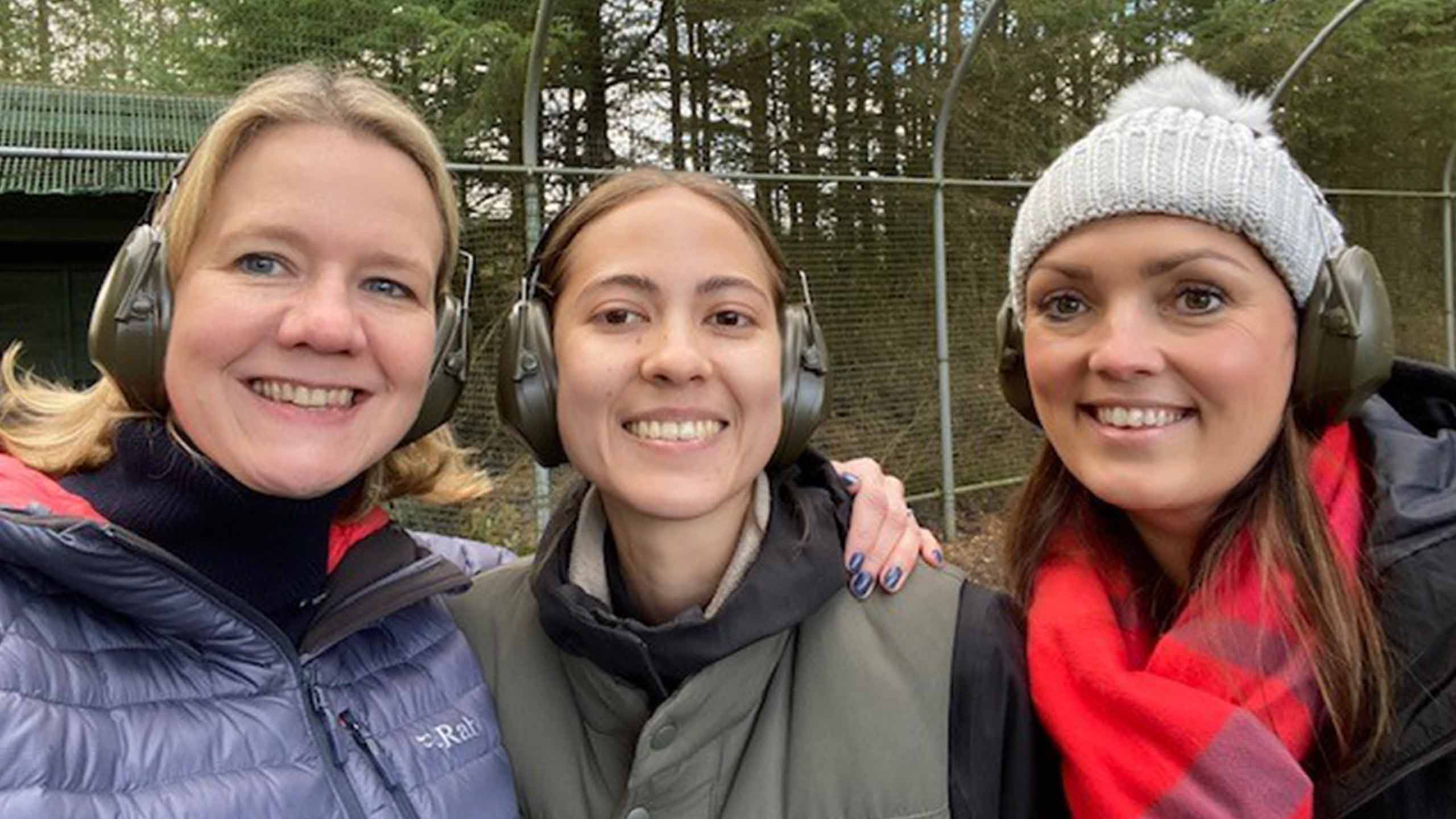 The Media Shop team - at a shooting range wearing earmuffs