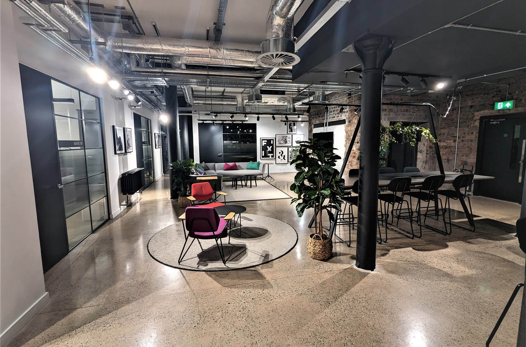 The Media Shop -large open area with tables and chairs